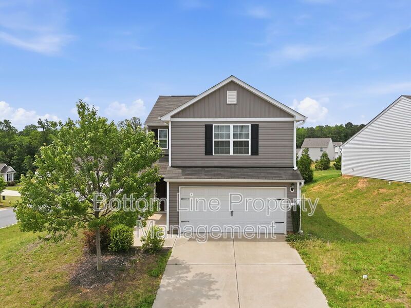 295 Windbreak Lane, Youngsville, NC 27596  $[Insert Listing Price] | 3 Bedrooms | 3 Bathrooms | 1,858 Sq Ft property image