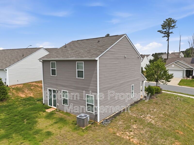 295 Windbreak Lane, Youngsville, NC 27596  $[Insert Listing Price] | 3 Bedrooms | 3 Bathrooms | 1,858 Sq Ft property image