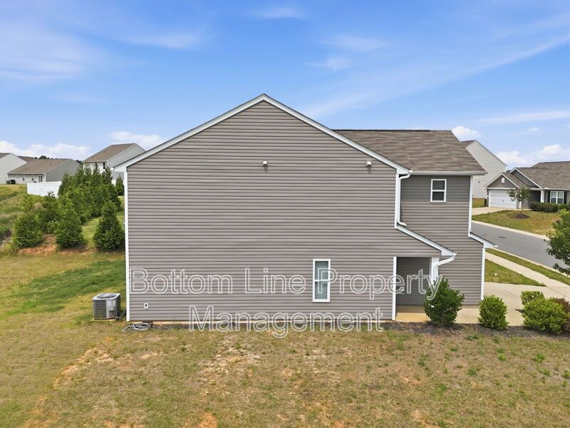 295 Windbreak Lane, Youngsville, NC 27596  $[Insert Listing Price] | 3 Bedrooms | 3 Bathrooms | 1,858 Sq Ft property image