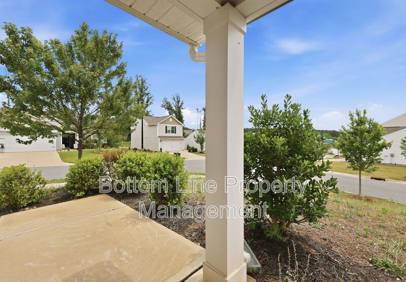 295 Windbreak Lane, Youngsville, NC 27596  $[Insert Listing Price] | 3 Bedrooms | 3 Bathrooms | 1,858 Sq Ft property image