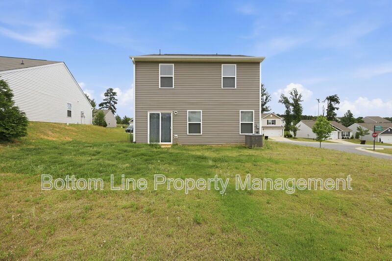 295 Windbreak Lane, Youngsville, NC 27596  $[Insert Listing Price] | 3 Bedrooms | 3 Bathrooms | 1,858 Sq Ft property image