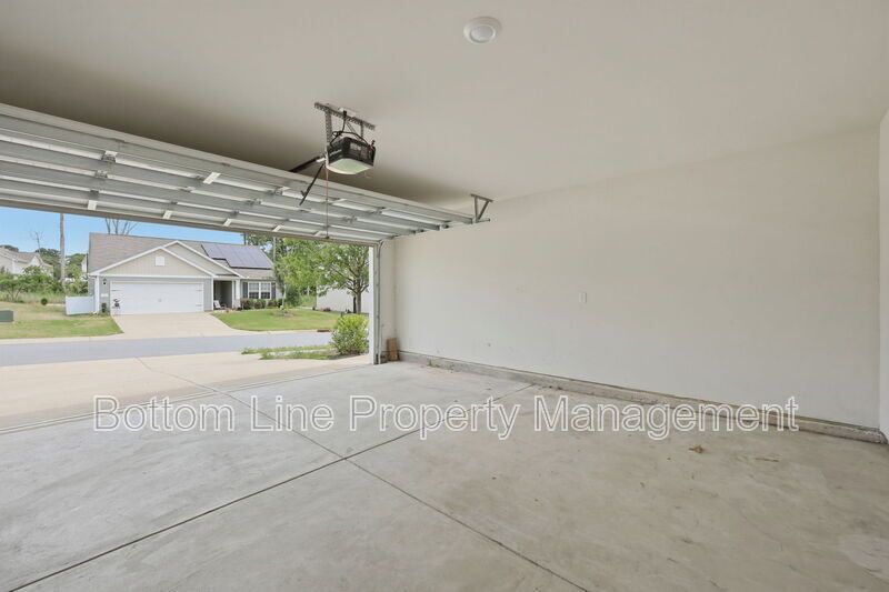 295 Windbreak Lane, Youngsville, NC 27596  $[Insert Listing Price] | 3 Bedrooms | 3 Bathrooms | 1,858 Sq Ft property image