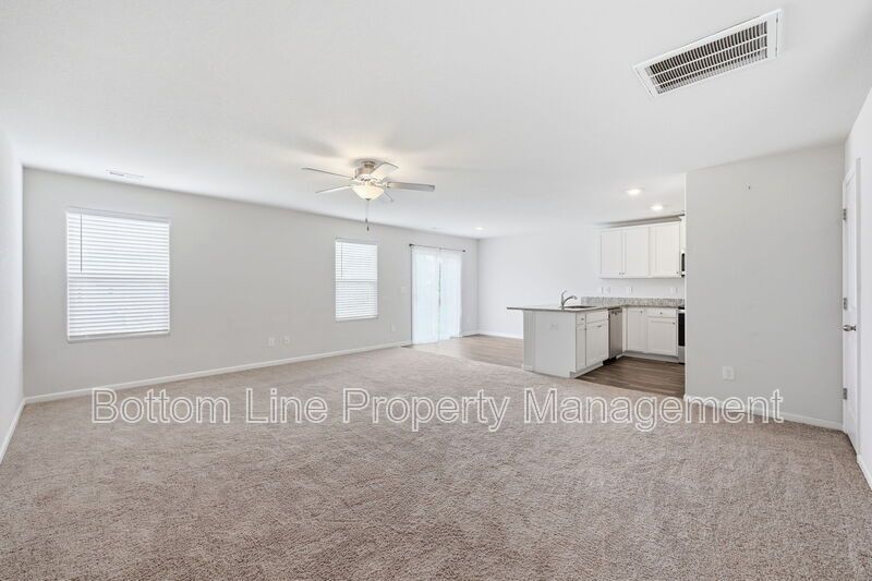 295 Windbreak Lane, Youngsville, NC 27596  $[Insert Listing Price] | 3 Bedrooms | 3 Bathrooms | 1,858 Sq Ft property image