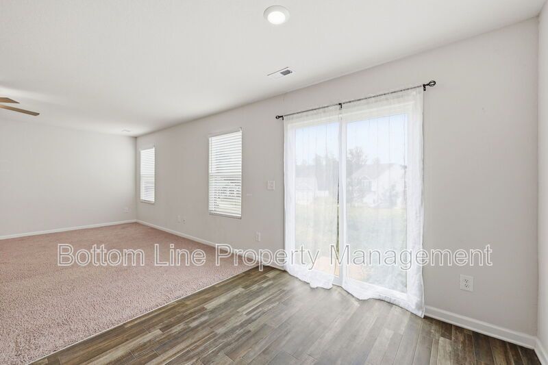 295 Windbreak Lane, Youngsville, NC 27596  $[Insert Listing Price] | 3 Bedrooms | 3 Bathrooms | 1,858 Sq Ft property image