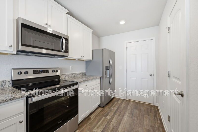 295 Windbreak Lane, Youngsville, NC 27596  $[Insert Listing Price] | 3 Bedrooms | 3 Bathrooms | 1,858 Sq Ft property image