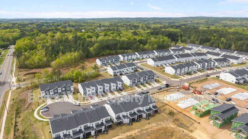 ✨ End-Unit Townhome with Designer Finishes, Screened Porch & Garage in Prime Durham Location property image