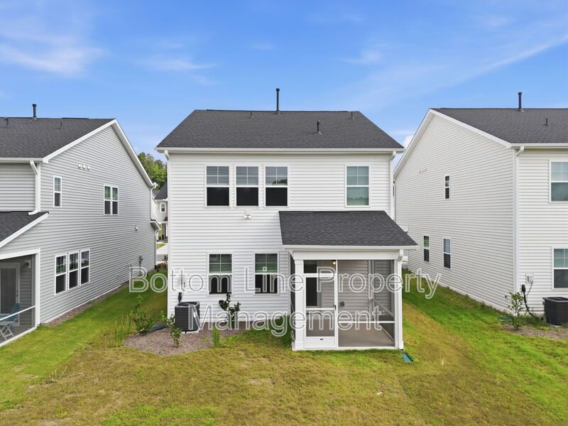 ✨ End-Unit Townhome with Designer Finishes, Screened Porch & Garage in Prime Durham Location property image