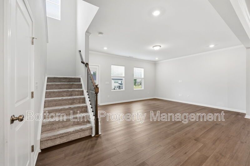 ✨ End-Unit Townhome with Designer Finishes, Screened Porch & Garage in Prime Durham Location property image