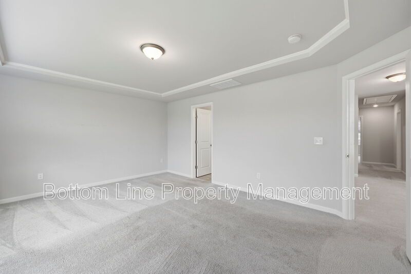 ✨ End-Unit Townhome with Designer Finishes, Screened Porch & Garage in Prime Durham Location property image