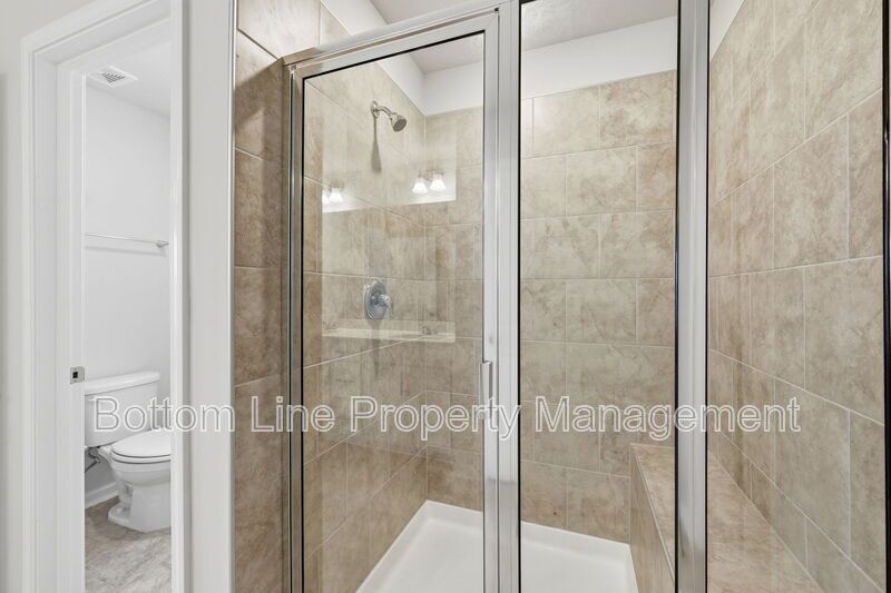 ✨ End-Unit Townhome with Designer Finishes, Screened Porch & Garage in Prime Durham Location property image