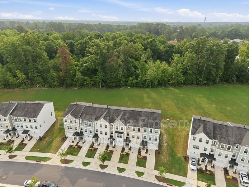 Modern 3BR Townhome in Pool Community | 1-Car Garage | Quartz Counters | Luxury Primary Suite property image