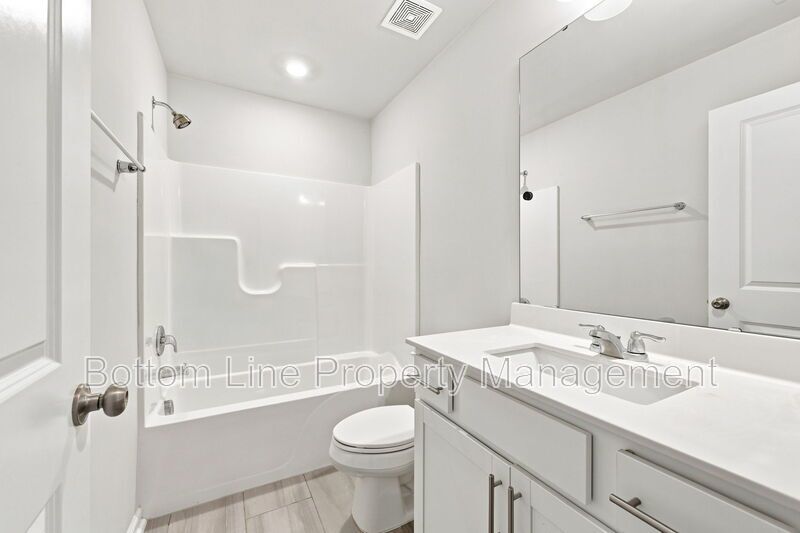 Modern 3BR Townhome in Pool Community | 1-Car Garage | Quartz Counters | Luxury Primary Suite property image