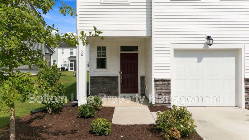 Stunning 3-Bedroom End-Unit Townhome with Garage & Screened Porch – In Pool Community property image