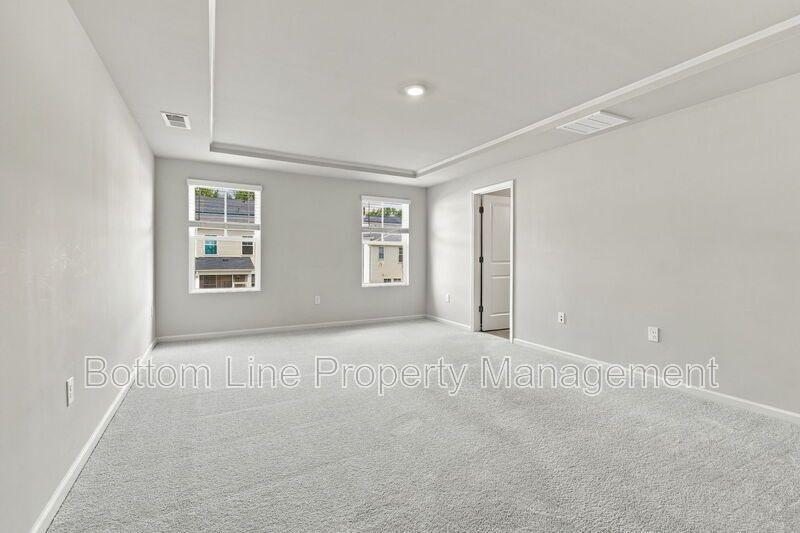 Stunning 3-Bedroom End-Unit Townhome with Garage & Screened Porch – In Pool Community property image
