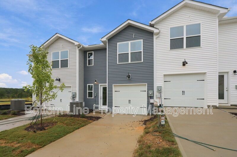 Brand-New 3BR Townhome with Garage in Pool Community property image