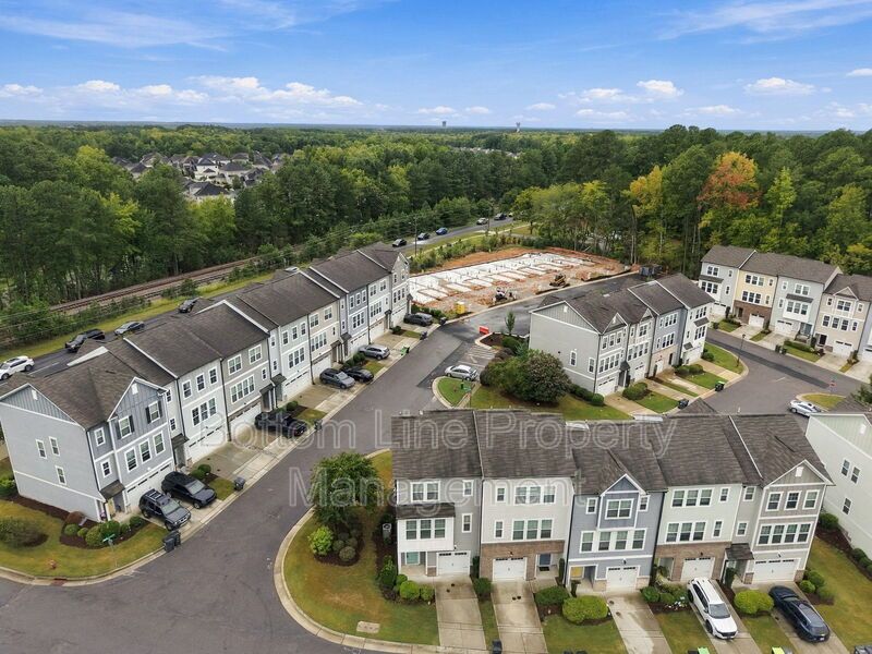 Room to Relax!  Spacious 2BR Apex End-Unit Townhome with Game Room & Garage property image