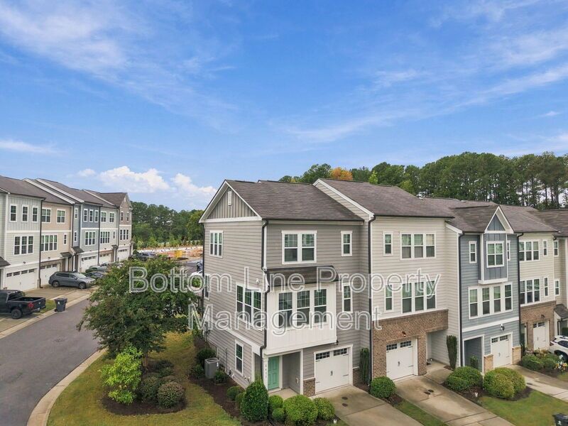 Room to Relax!  Spacious 2BR Apex End-Unit Townhome with Game Room & Garage property image