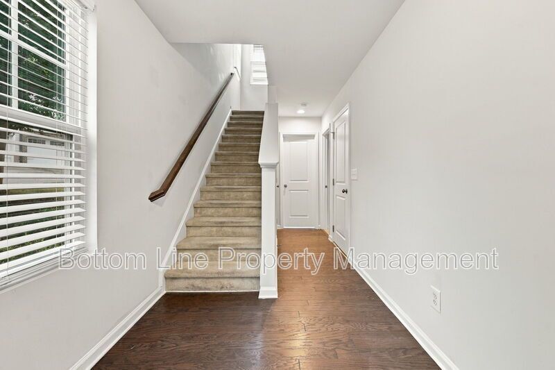 Room to Relax!  Spacious 2BR Apex End-Unit Townhome with Game Room & Garage property image