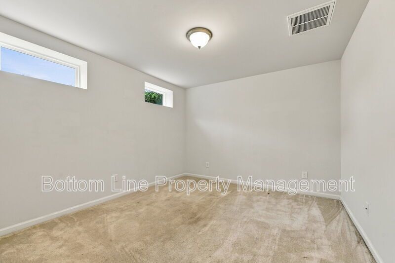Room to Relax!  Spacious 2BR Apex End-Unit Townhome with Game Room & Garage property image