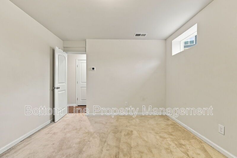 Room to Relax!  Spacious 2BR Apex End-Unit Townhome with Game Room & Garage property image