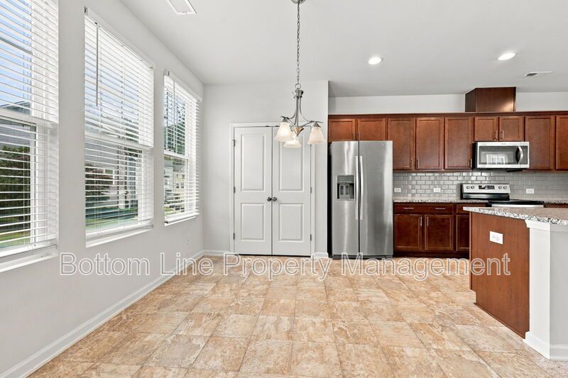 Room to Relax!  Spacious 2BR Apex End-Unit Townhome with Game Room & Garage property image