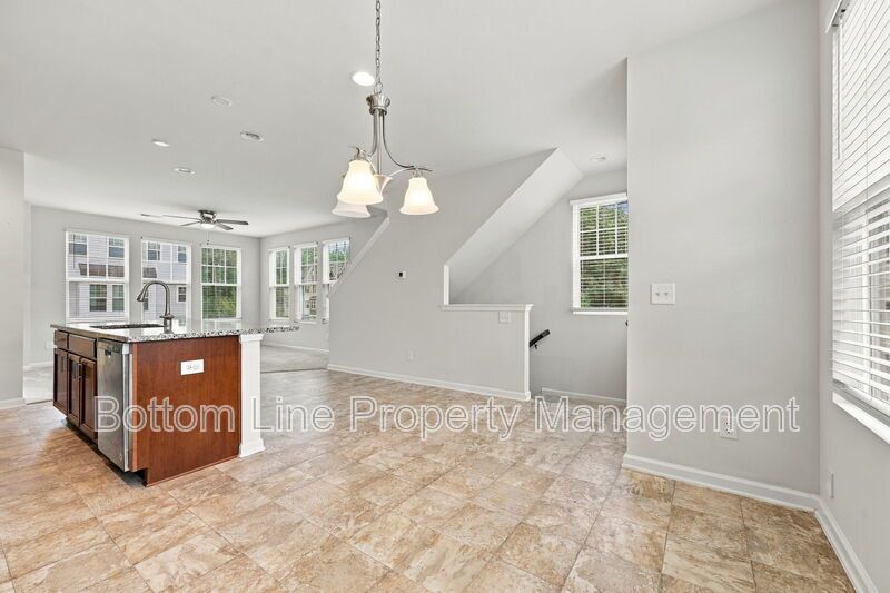 Room to Relax!  Spacious 2BR Apex End-Unit Townhome with Game Room & Garage property image