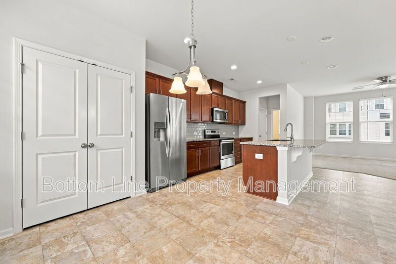 Room to Relax!  Spacious 2BR Apex End-Unit Townhome with Game Room & Garage property image