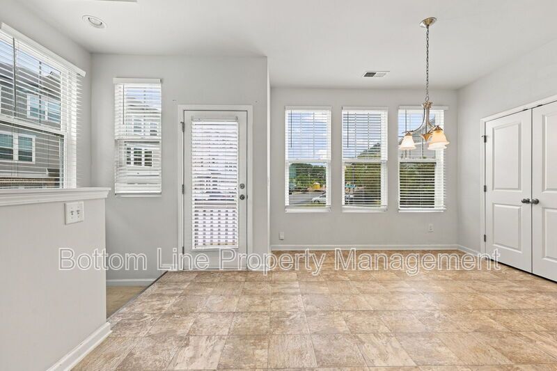 Room to Relax!  Spacious 2BR Apex End-Unit Townhome with Game Room & Garage property image