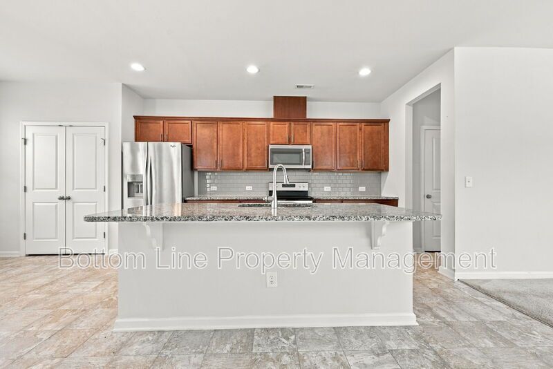 Room to Relax!  Spacious 2BR Apex End-Unit Townhome with Game Room & Garage property image