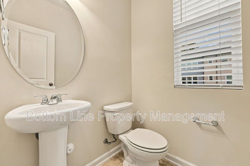 Room to Relax!  Spacious 2BR Apex End-Unit Townhome with Game Room & Garage property image