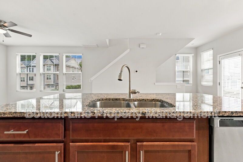 Room to Relax!  Spacious 2BR Apex End-Unit Townhome with Game Room & Garage property image