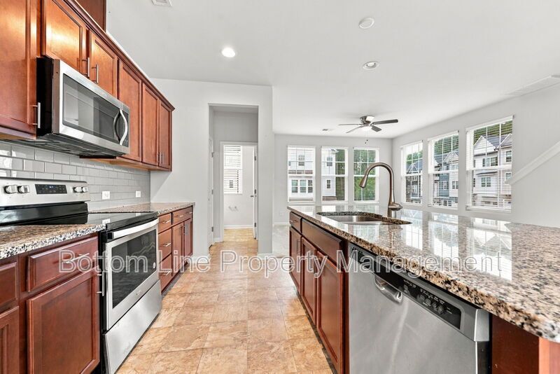 Room to Relax!  Spacious 2BR Apex End-Unit Townhome with Game Room & Garage property image