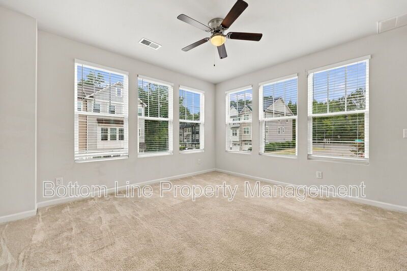 Room to Relax!  Spacious 2BR Apex End-Unit Townhome with Game Room & Garage property image