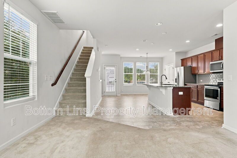 Room to Relax!  Spacious 2BR Apex End-Unit Townhome with Game Room & Garage property image