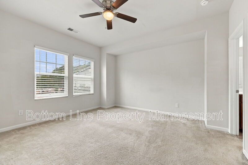 Room to Relax!  Spacious 2BR Apex End-Unit Townhome with Game Room & Garage property image