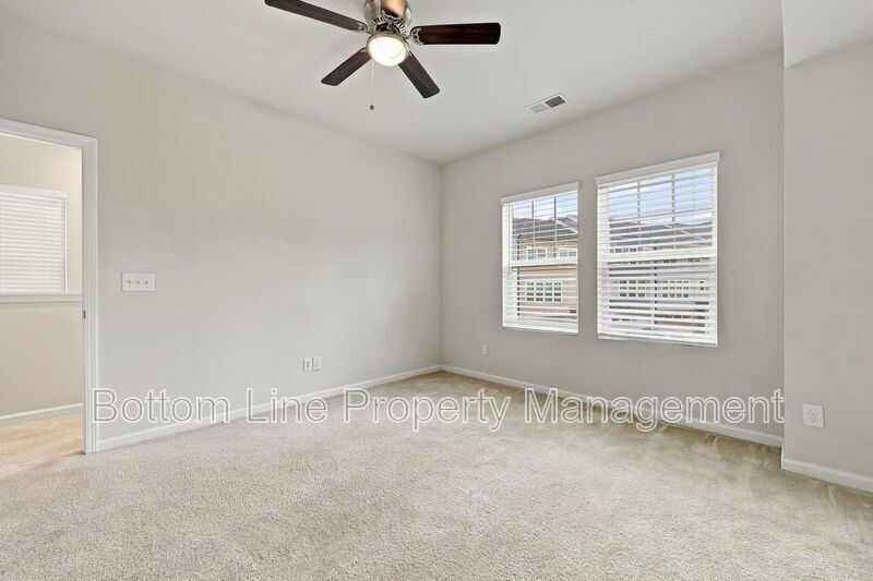 Room to Relax!  Spacious 2BR Apex End-Unit Townhome with Game Room & Garage property image