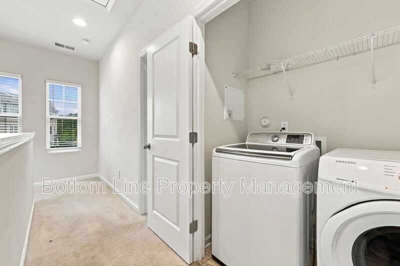 Room to Relax!  Spacious 2BR Apex End-Unit Townhome with Game Room & Garage property image