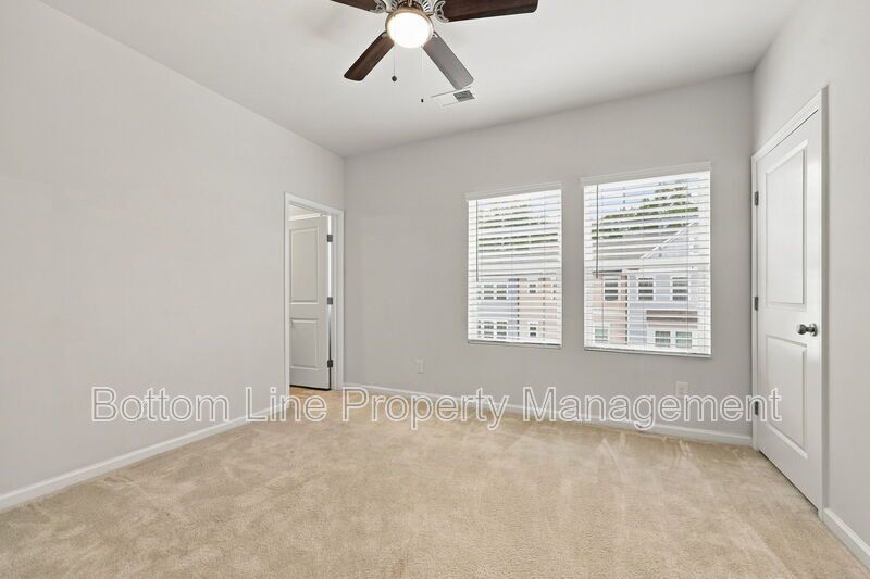 Room to Relax!  Spacious 2BR Apex End-Unit Townhome with Game Room & Garage property image