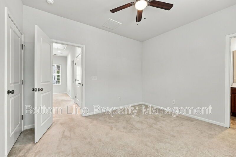 Room to Relax!  Spacious 2BR Apex End-Unit Townhome with Game Room & Garage property image