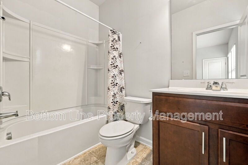 Room to Relax!  Spacious 2BR Apex End-Unit Townhome with Game Room & Garage property image