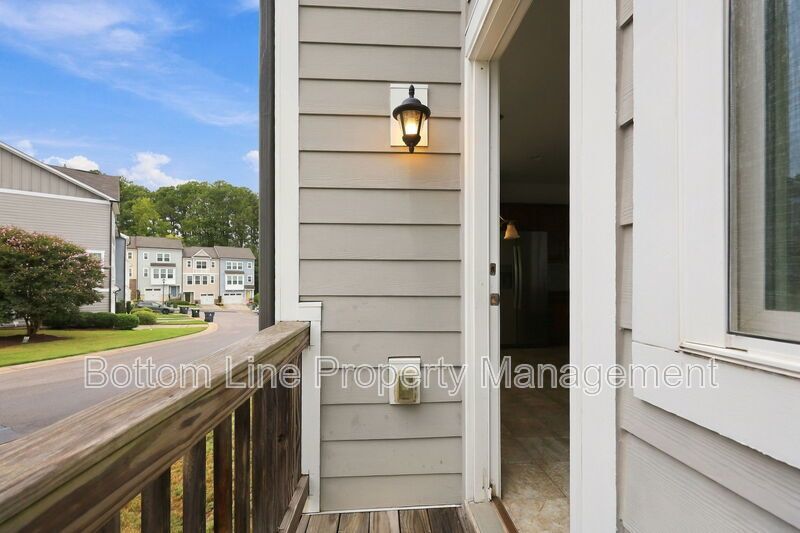 Room to Relax!  Spacious 2BR Apex End-Unit Townhome with Game Room & Garage property image