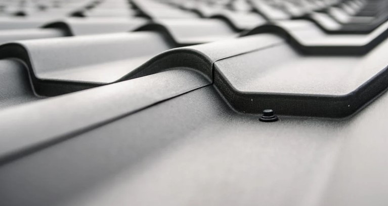 How Effective Roofing Solutions Enhance Commercial Property Management